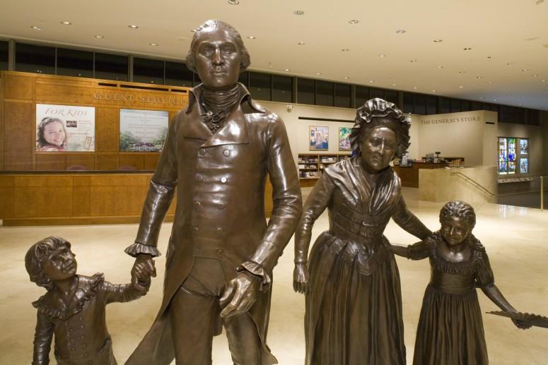 Bronze statues of the Washington family in the lobby of the Ford Orientation Center