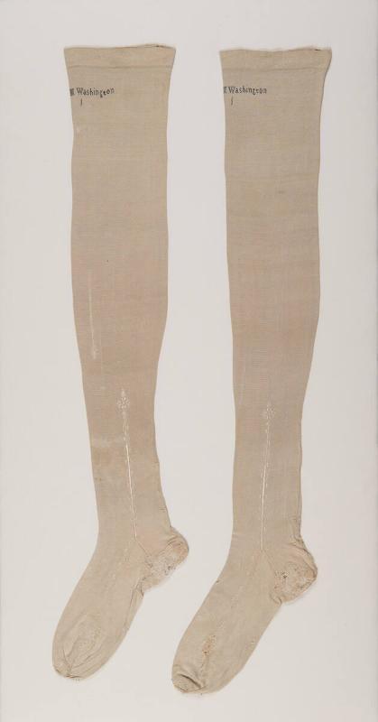 Pair of silk stockings,18th century. Object number W-2471/A-B. 