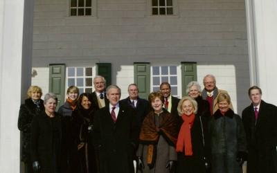 President George W. Bush, First Lady Laura Bush, members of the Mount Vernon Ladies' Association, and guests during a President's Day ceremony in 2007…